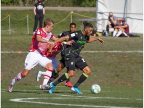 Canadian Premier League - York9 FC  vs Cavalry FC - Charlottetown, PEI- Sept 5, 2020]. Cavalry FC #15 Elliot Simmons chases down the ball.
