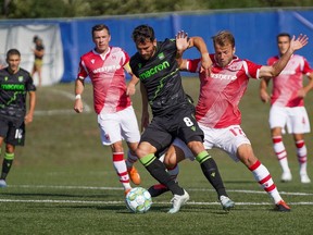 Cavalry FC’s Nico Pasquotti looks to get the ball from York9 FC during their match in Charlottetown, P.E.I. on Sept. 5, 2020. (CPL/Chant Photography)