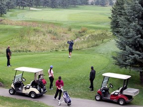 Golfers are seen enjoying the links at Elbow Springs Golf Club on Saturday, Sept. 19, 2020. Brendan Miller/Postmedia