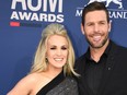 Carrie Underwood and husband Mike Fisher arrive for the 54th Academy of Country Music Awards on April 7, 2019, at the MGM Grand Garden Arena in Las Vegas, Nevada.