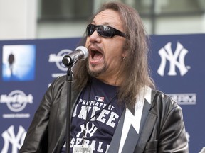 Ace Frehley, former lead guitarist of KISS, sings at the opening of the Hard Rock Cafe at the new Yankee Stadium April 2, 2009 in New York.