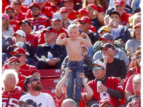 A young Calgary Stampeders fan flexes   as the Stamps beat the Edmonton Eskimos in the Labour Day classic at McMahon stadium in Calgary on Monday, September 2, 2019. Darren Makowichuk/Postmedia