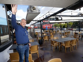 Gary Maskell, general manager of Loco Lou's, shows the heaters on his patio in Calgary on Monday, September 7, 2020.
