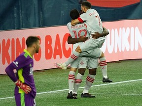 Toronto FC celebrate a goal by Ayo Akinola during Wednesday's game against the New England Revolution.