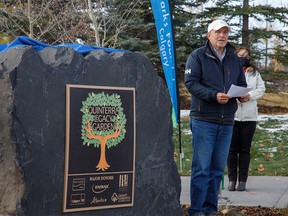 Barclay Hunter, father of homicide victim Josh Hunter, speaks at the opening of the new Quinterra Legacy Garden at South Glenmore Park in Calgary, Ab., on Thursday October 15, 2020. The Quinterra Legacy Garden honours the lives of Lawrence Hong, Josh Hunter, Kaitlan (Kaiti) Perras, Jordan Segura and Zackariah Rathwell who were killed in 2014.