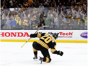 BOSTON, MASSACHUSETTS - APRIL 23: Fans celebrate in front of Joakim Nordstrom #20 of the Boston Bruins after he scored a goal against the Toronto Maple Leafs during the first period of Game Seven of the Eastern Conference First Round during the 2019 NHL Stanley Cup Playoffs at TD Garden on April 23, 2019 in Boston, Massachusetts.