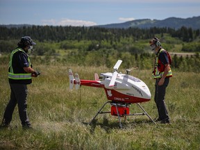 Researchers investigate drone delivery of medical supplies to remote communities during the pandemic. UCalgary, SAIT, AHS, and Alberta Precision Laboratories partner with the Stoney Nakoda Nations. Shahab Moeini and Wade Hawkins, lead researchers at SAIT’s CIRUS, prepare for the test flight at Stoney Nakoda Nations Morley reserve on June 25.