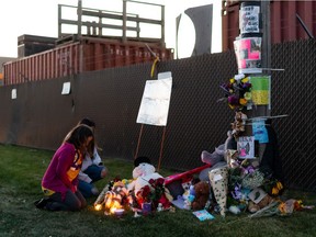 Sierra Chalifoux-Thompson's family and supporters laid flowers, lit candles and dropped off toys at her memorial at 75 Street and Mount Lawn Road in Edmonton, on Monday, Oct. 5, 2020. Chalifoux-Thompson was fatally assaulted Friday night.