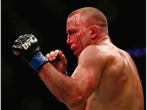 Georges St-Pierre of Canada fights Michael Bisping of England in their UFC middleweight championship bout during the UFC 217 event at Madison Square Garden on November 4, 2017 in New York City.