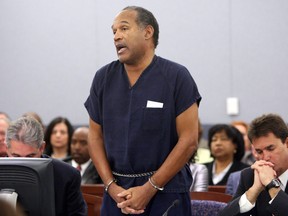 (FILES) In this file photo taken on December 4, 2008, OJ Simpson speaks in court prior to his sentencing as his attorneys Gabriel Grasso (L) and Yale Galanter listen at the Clark County Regional Justice Center in Las Vegas, Nevada. Simpson and co-defendant Clarence "C.J." Stewart were sentenced on 12 charges, including felony kidnapping, armed robbery and conspiracy related to a 2007 confrontation with sports memorabilia dealers in a Las Vegas hotel. Issac Brekken-Pool - Just days after the 25th anniversary of the gruesome double murder of which he was accused but acquitted, OJ Simpson has opened a Twitter account with a vow to do "a little getting even." "Hey, Twitter world, this is yours truly," the former football star and actor says in a video that, for now, is his only post. Simpson's lawyer Malcolm LaVergne confirmed to CNN that the account was authentic, as was the video, apparently filmed by Simpson on a smartphone in the yard of a Las Vegas residence.