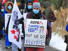 Healthcare workers protest during a walkout at the Foothills Hospital in Calgary on Monday, October 26, 2020.