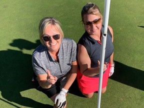 Marcia Brauer, left, and Angie Larson drained back-to-back aces during a round at Coyote Creek Golf & RV Resort in October 2020. (Supplied photo)