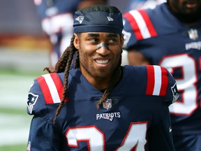 Stephon Gilmore of the New England Patriots looks on before a game against the Las Vegas Raiders at Gillette Stadium on Sept. 27, 2020 in Foxborough, Mass.