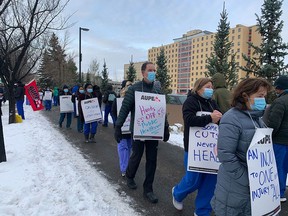 The walkouts involving about 150 staff at the Foothills Medical Centre and 100 at the South Health Campus were not ordered or organized by the union, said an AUPE official, but were a grassroots show of defiance.