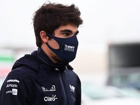 Racing Point's Canadian driver Lance Stroll arrives to inspect the circuit ahead of the Formula One Eifel Grand Prix at the Nuerburgring circuit in Nuerburg, Germany, Oct. 8, 2020.