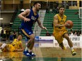 The University of Alberta Golden Bears' Tyus Jefferson (2) battles the UBC Thunderbirds' Patrick Simon (11) during Game 3 of their Canada West playoff series, in Edmonton Sunday Feb. 24, 2019. Photo by David Bloom