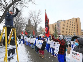 Alberta Union of Provincial Employees (AUPE) vice-president Bobby-Joe Borodey speaks to Healthcare workers protesting during a walkout at the Foothills Hospital in Calgary on Monday, October 26, 2020.