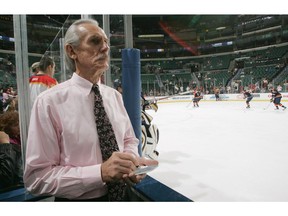George Kingston, then an assistant coach with the Florida Panthers, takes notes during warm-ups prior to the start of the NHL game against the Pittsburgh Penguins in this photo from Jan. 10, 2007, at the Bank Atlantic Center in Sunrise, Fla.