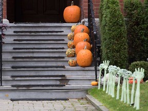 Halloween decorations and pumpkins are shown at a house in Montreal, Friday, Nov. 1, 2019.