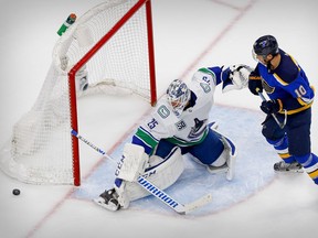 Vancouver Canucks goaltender Jacob Markstrom blocks a shot by St. Louis Blues centre Brayden Schenn during Game 5 of the first round of the 2020 Stanley Cup Playoffs at Rogers Place on Aug. 19, 2020. Perry Nelson/USA TODAY Sports