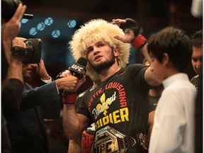 MMA - UFC 242 - Khabib Nurmagomedov v Dustin Poirier - Men's UFC Lightweight title - Yas Island, Abu Dhabi, United Arab Emirates - September 7, 2019  Khabib Nurmagomedov speaks to the media after winning his match against Dustin Poirier  REUTERS/Christopher Pike ORG XMIT: AI