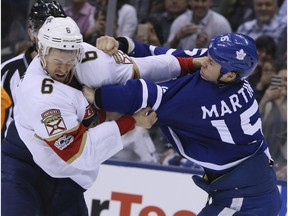 Florida Panthers defenseman Alex Petrovic (6) and Toronto Maple Leafs left wing Matt Martin (15) on Tuesday March 28, 2017. The Toronto Maple Leafs host the Florida Panthers at the Air Canada Centre in Toronto. Veronica Henri/Toronto Sun/Postmedia Network