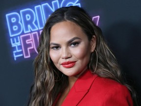 Chrissy Teigen attends the premiere of NBC's "Bring The Funny" at Rockwell Table & Stage, June 26, 2019 in Los Angeles.