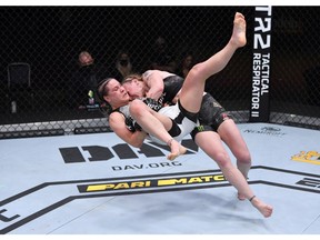 Valentina Shevchenko of Kyrgyzstan takes down Jennifer Maia of Brazil in their women’s flyweight championship bout during the UFC 255 event at UFC APEX on November 21, 2020 in Las Vegas, Nevada.
