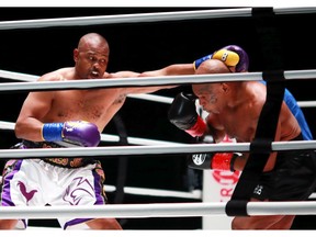 Roy Jones Jr. throws a punch in the second round against Mike Tyson during Mike Tyson vs Roy Jones Jr. presented by Triller at Staples Center on November 28, 2020 in Los Angeles, California.