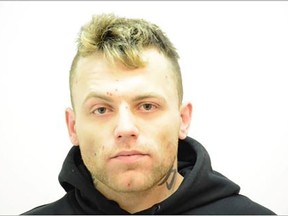 Michael Andrew Onischuk, 33, is wanted on a Canada-wide warrant for murder, according to Calgary police.
