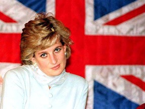 Diana, Princess of Wales, sits in front of a British flag during a visit to the Shaukat Khanum Memorial Cancer Hospital in Lahore February 22, 1997.