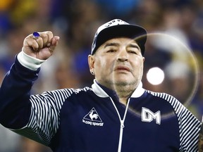 Diego Armando Maradona head coach of Gimnasia y Esgrima La Plata gestures to fans before a match between Boca Juniors and Gimnasia y Esgrima La Plata as part of Superliga 2019/20 at Alberto J. Armando Stadium on March 7, 2020 in Buenos Aires, Argentina.