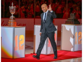 2019 memorable photo of the year - Postmedia Calgary - From Al Charest: "It's pretty cool having the privilege to spend many nights at the Saddledome shooting photos of NHL hockey. On this night, hockey fans honoured longtime captain, Jarome Iginla Ñ the Calgary Flames all-time leader in points and games played Ñ by retiring his #12 jersey in Calgary on Saturday, March 2, 2019. Al Charest/Postmedia  ORG XMIT: POS1903022105510106 ORG XMIT: POS1912091301160136