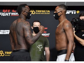 Ovince Saint Preux and Jamahal Hill face off during the UFC Fight Night weigh-in at UFC APEX in Las Vegas on Dec. 4, 2020.