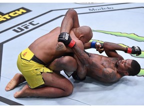 Kevin Holland elbows Jacare Souza of Brazil in their middleweight bout during the UFC 256 event at UFC APEX on December 12, 2020 in Las Vegas, Nevada.