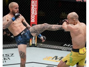 Marlon Vera of Ecuador kicks Jose Aldo of Brazil in a bantamweight fight during the UFC Fight Night event at UFC APEX on December 19, 2020 in Las Vegas, Nevada.
