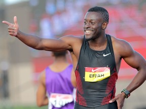 Sam Effah points to a supporter after winning the men’s 100 metres at the Canadian Track and Field Championships at Foothills Athletic Park in Calgary on June 24, 2011.