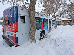 A bus remained stuck for hours on 12th Street N.E. in Calgary — one of hundreds of stranded and stuck vehicles across the city on Tuesday, Dec. 22, 2020 after a winter storm blanketed the city overnight.