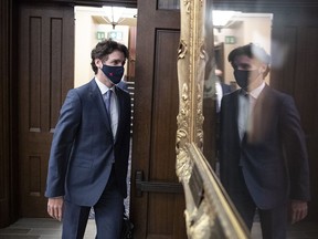 Prime Minister Justin Trudeau arrives for the tabling of a fiscal update in the House of Commons, in Ottawa, on Monday, Nov. 30, 2020.