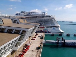 A view of the terminal from the Royal Caribbean's Quantum of the Seas cruise ship, after it docked at Marina Bay Cruise Center after a passenger tested positive for coronavirus disease (COVID-19) during a cruise to nowhere, in Singapore, in this still picture obtained from social media video December 9, 2020.