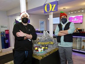 Brothers Ahmed and Ahsen with some of the popular items at Mt. Kushmore Cannabis Dispensary during the Christmas season in Calgary on Tuesday, Dec. 22, 2020.