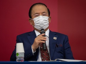 Tokyo 2020 Olympic Games CEO Toshiro Muto wears a face mask as he speaks during a press conference following a Tokyo2020 Olympics Executive Board meeting on December 22, 2020 in Tokyo, Japan.