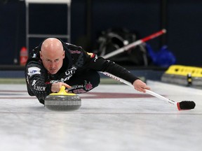 Canada’s Kevin Koe throws a rock in the final of the ATB Glencoe Invitational Bonspiel against Sweden’s Niklas Edin at the Glencoe Club in Calgary on Feb. 16, 2020.