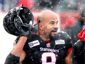 Calgary Stampeders running back Jon Cornish walks to the dressing room after taking a hit against the Winnipeg Blue Bombers at McMahon Stadium in Calgary on Nov. 1, 2014.