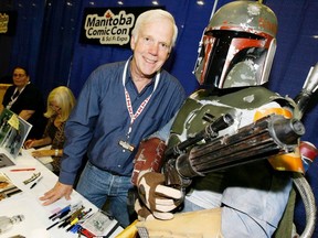 Jeremy Bulloch who played Boba Fett in the originial Star Wars trilogy poses with Boba Fett fan Dave Ratte at the Manitoba Comic Con and Sci Fi Expo at the Winnipeg Convention Centre in Winnipeg in this October 11, 2008 file photo.