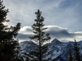 Clouds rip past the peaks over Upper Kananaskis Lake west of Calgary, Ab., on Monday, December 7, 2020.