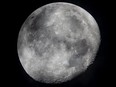 A waning moon is seen in the sky over Frankfurt, Germany, Oct. 5, 2020.