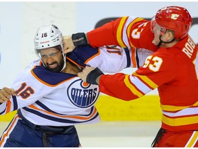 Postmedia Calgary POY 2020 - 
Al Charest: "The adrenaline at the Saddledome is always pumping a lot higher when covering the Battle of Alberta, and the timing is what makes this photo stand out to me, capturing the moment when Calgary Flames Buddy Robinson lands a punch to the helmet of Edmonton Oilers Jujhar Khaira during a fight at the Saddledome, February 1, 2020."
ORG XMIT: POS2002012155332664