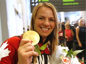Gold medal winning wrestler Erica Wiebe arrives at Pearson on a flight from Rio on Tuesday August 23, 2016. Michael Peake/Toronto Sun/Postmedia Network