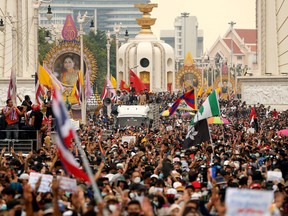FILE PHOTO: Pro-democracy demonstrators march during a Thai anti-government mass protest, on the 47th anniversary of the 1973 student uprising, in Bangkok, Thailand October 14, 2020.